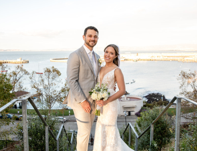 A bride and groom at their sunset park wedding