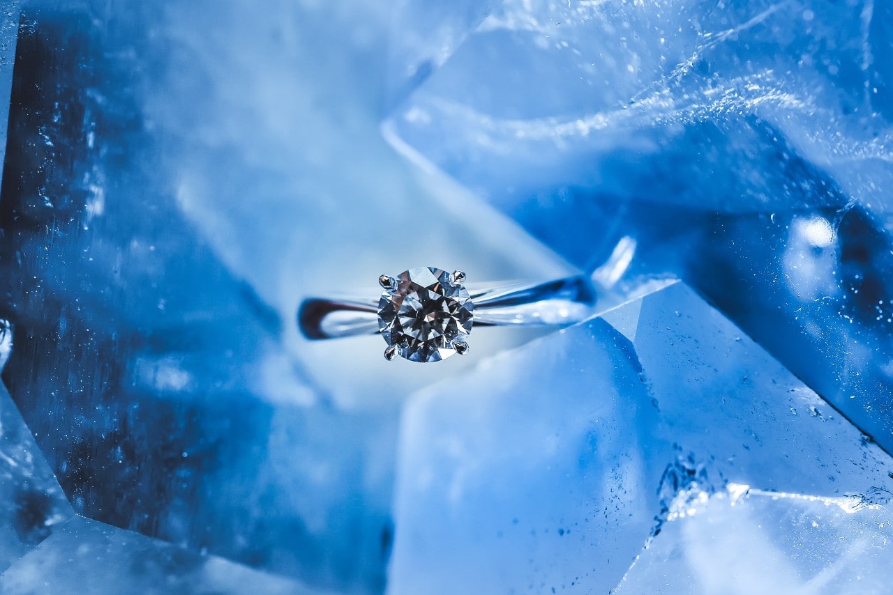 solitaire engagement ring on ice